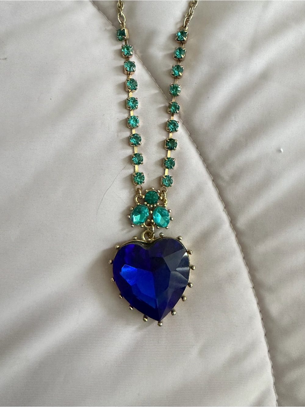 Gold-Tone Necklace with Royal Blue Heart and Emerald Accents